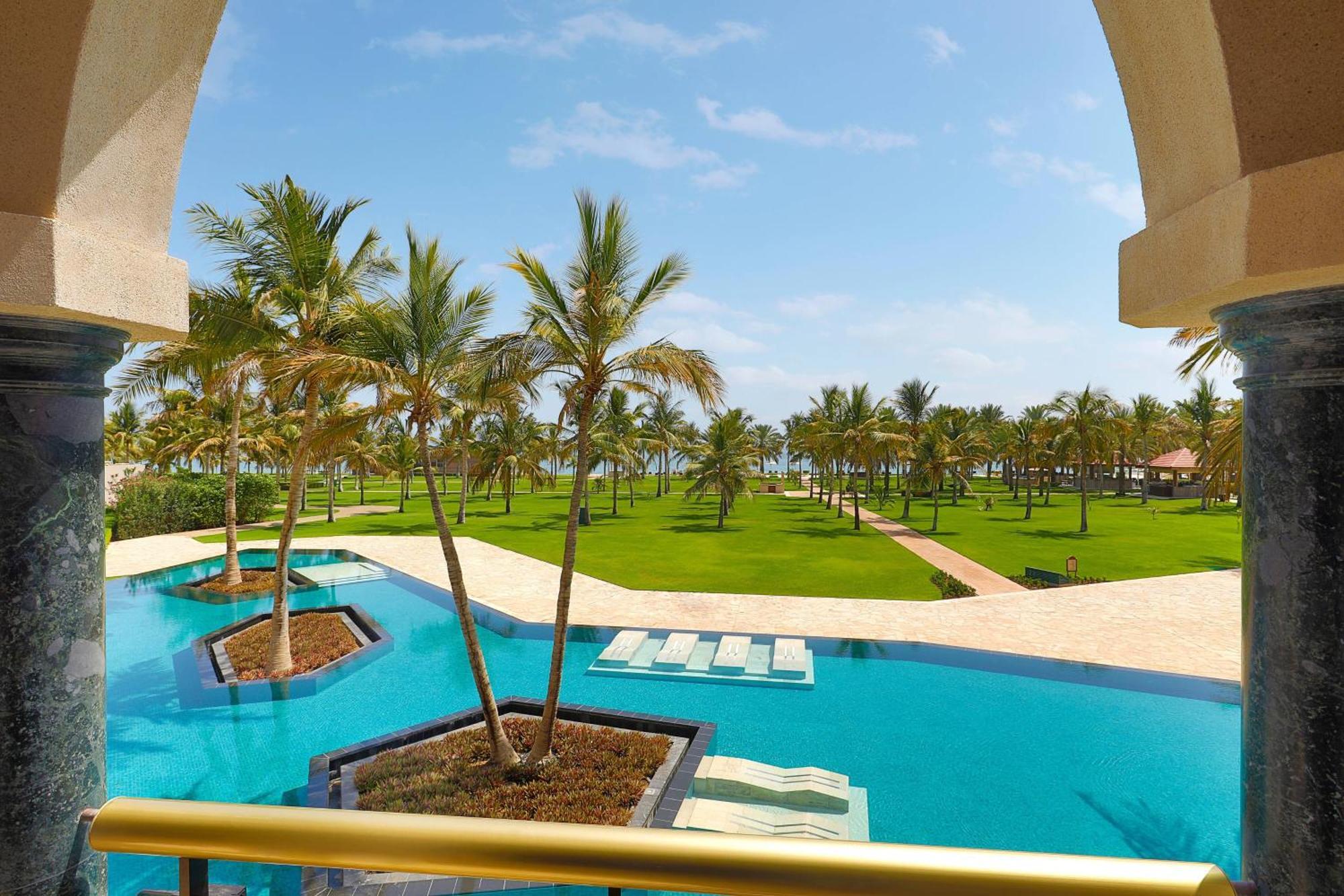 Al Bustan Palace, A Ritz-Carlton Hotel Muscat Exterior photo The pool at the resort