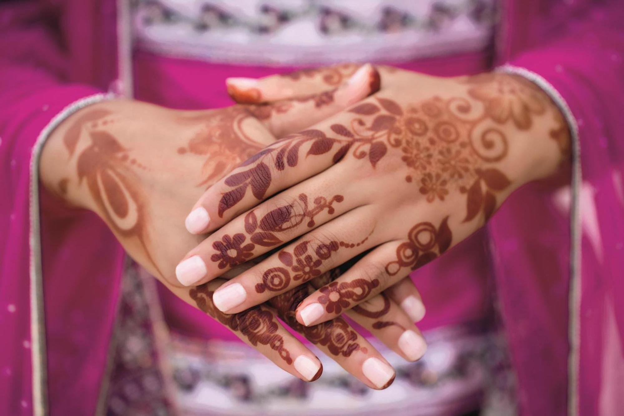Al Bustan Palace, A Ritz-Carlton Hotel Muscat Exterior photo Henna tattoo